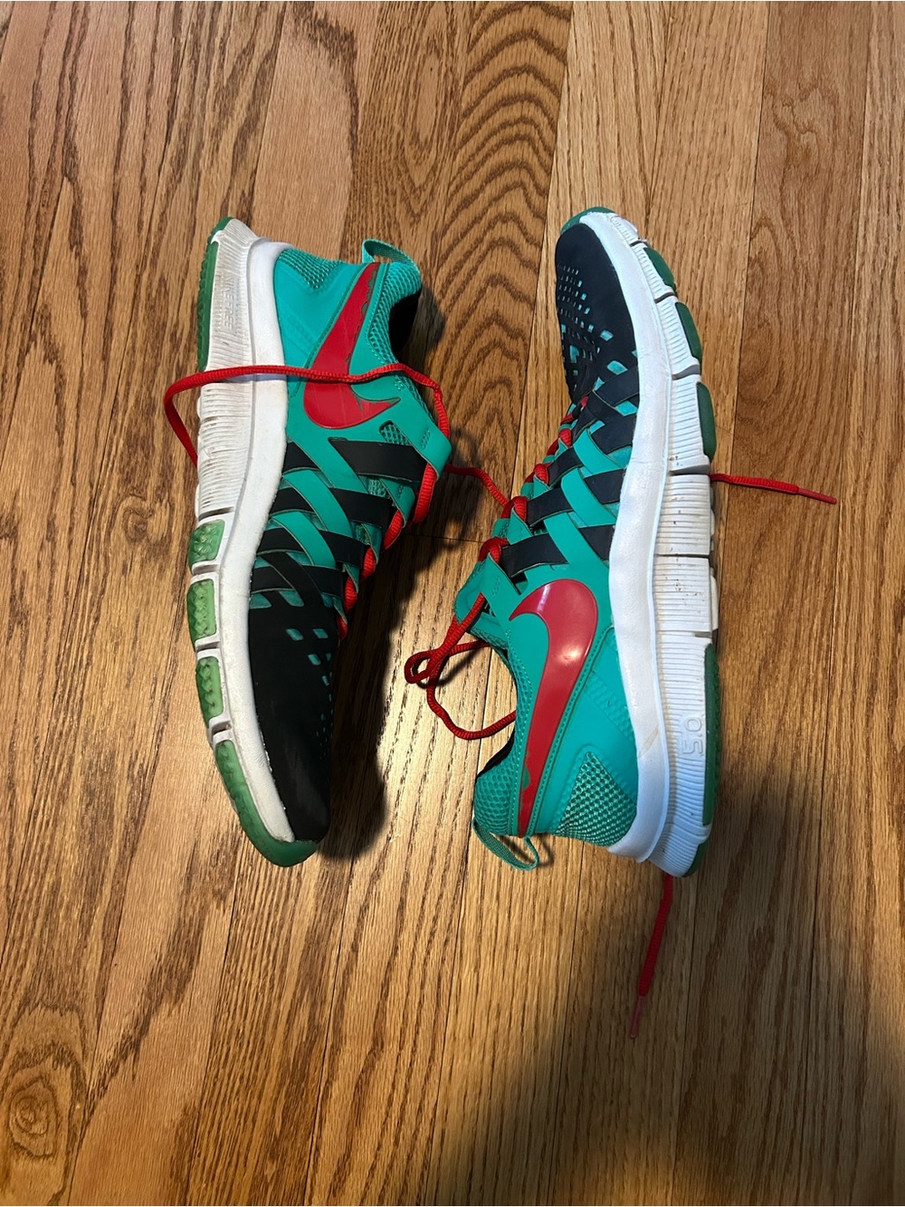 Nike Teal and Black Free Runs